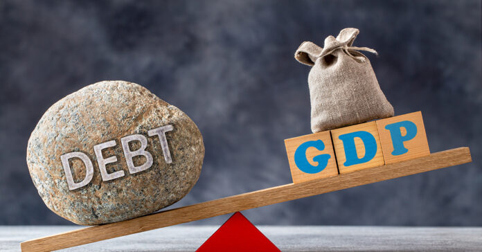Debt-to-gdp,Ratio,,A,Large,Stone,With,Text,Debt,And,Wooden